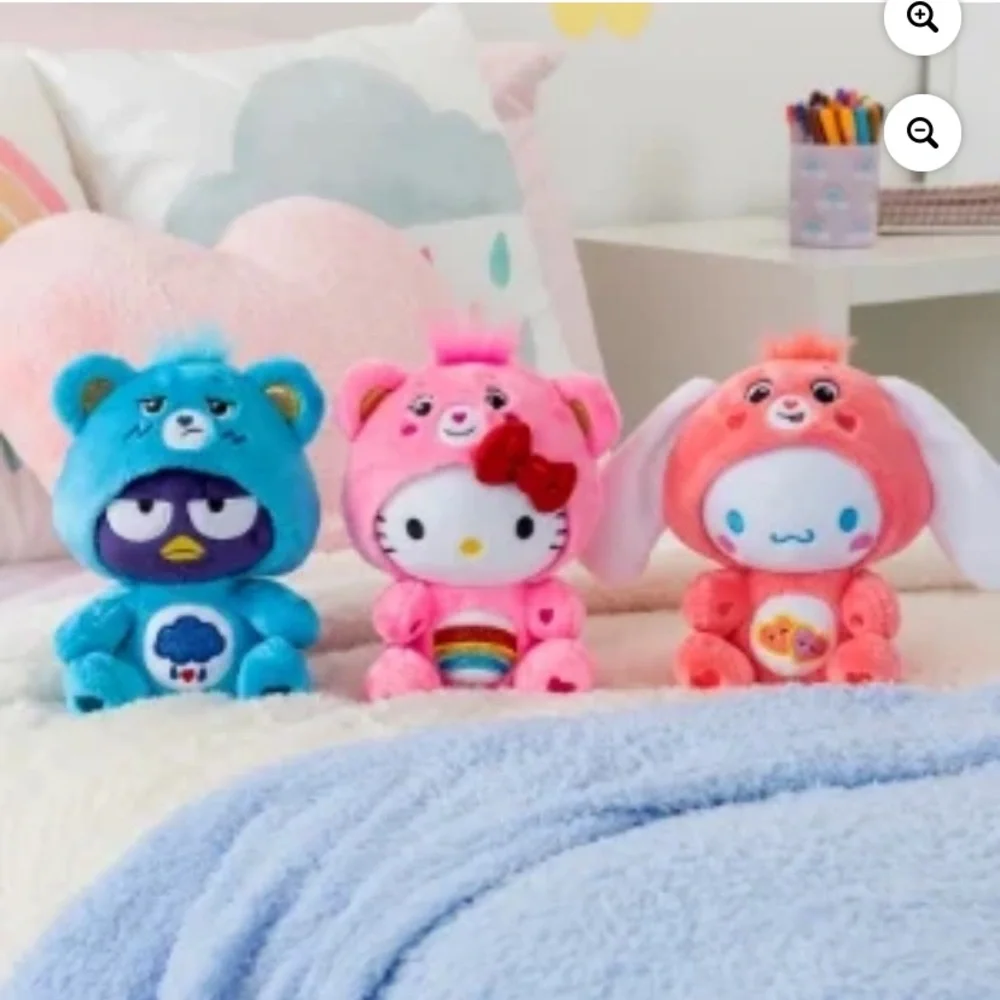 Hello Kitty Cinnamoroll plush dressed as Love-a-Lot Bear Care. Ear collaboration